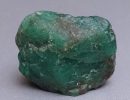Миниатюра к Необработанный камень изумруд, фото