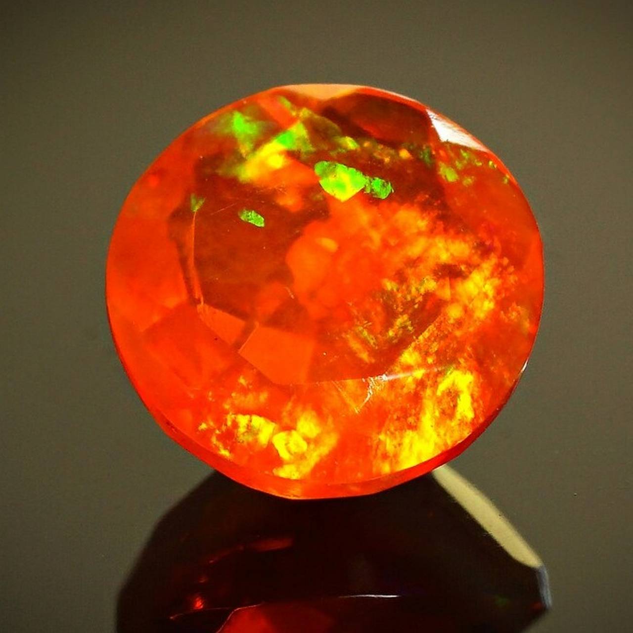 Ограненный Огненный опал Ограненный Огненный опал, фото